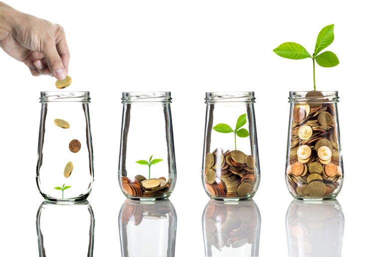 Hand into jar and coins - Independent Financial Planning – Stonehouse
